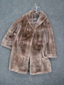 A mink fur coat with wrap