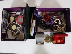 Two boxes containing assorted coins including Royal Mint World Savers coins, crowns , etc,