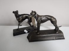 Two cast metal figures on bases,