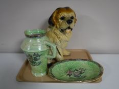 A tray containing a large pottery figure of a dog,
