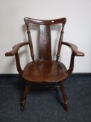 An inlaid elbow chair