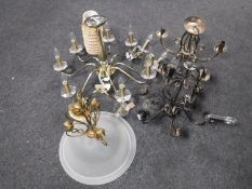 A contemporary brass eight-way light fitting together with a pair of matching wall lights and Three