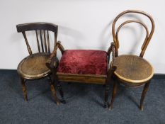 A mahogany storage piano stool,