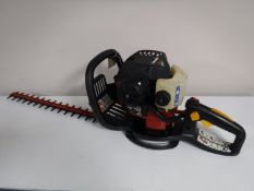 A Homelight Mighty petrol hedge trimmer