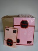 Two boxes containing a quantity of flat sheets, valance sheets and pillow cases (sealed,