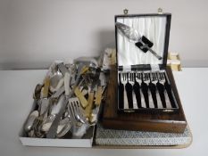 A tray containing an assorted quantity of boxed and unboxed cutlery