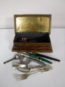 A vintage Crawford's biscuit tin containing pens, vintage keys, silver fork, two spoons,