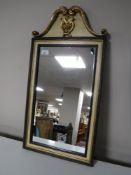 An ornate gilt framed hall mirror