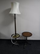 A mahogany standard lamp occasional table and a pedestal table