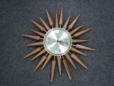 A late twentieth century Anstey Wilson quartz sunburst clock CONDITION REPORT: