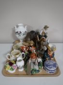 A tray containing a Beswick figure of a horse (brown gloss), continental figurines,