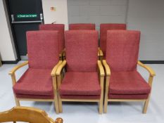 A set of six beech framed high backed armchairs