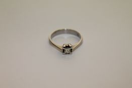 An 18ct white gold princess cut diamond ring