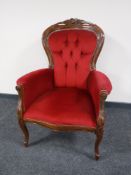 A Victorian style armchair,