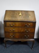 A mahogany Queen Anne style bureau