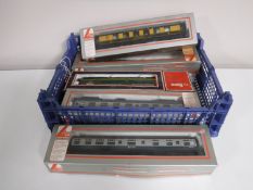 A box containing five boxed Lima railway models, including a Pullman Coach buffet car,