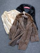 Three fur coats
