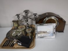 A tray of 20th century plated ware including candelabra, cutlery, M.P.