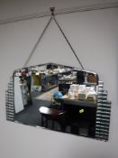 A frameless Art Deco mirror