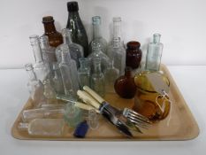 A tray of antique glass bottles, Jubilee Coronation mug,