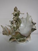 An Austrian porcelain shell figure with mother and child