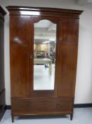 A Victorian inlaid mahogany mirrored door wardrobe