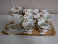 A tray containing a thirty-two piece Windsor bone china tea service