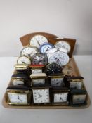 A tray of 19th assorted travel and mantel clocks