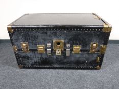 An early twentieth century Hartmann wardrobe trunk bearing shipping labels