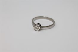 A platinum diamond solitaire ring CONDITION REPORT: The ring is in good condition