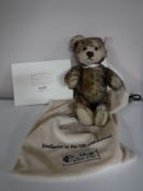 A boxed Steiff 'The English Teddy Bear' with dust bag and certificate