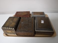 A tray of five carved Eastern trinket boxes