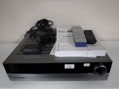 A Harman-kardon digital path receiver with leads and remotes