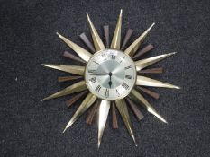 A late twentieth century Metamec quartz sunburst clock CONDITION REPORT: Sunburst