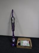 A H2O steam mop and a box of accessories