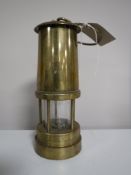 A brass miners lamp