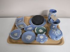 A tray containing thirteen pieces of Wedgwood Jasperware
