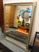 A contemporary silvered framed mirror 105 cm x 137 cm