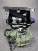 A Shakespeare fishing box containing bait hooks, lures, lines, flask,