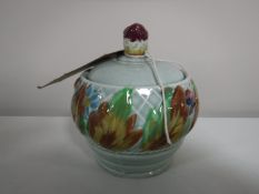 A Clarice Cliff preserve pot