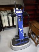 A Vibro Station Studio System and a Power Plank exerciser