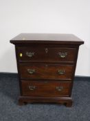 A mahogany Georgian style three drawer chest