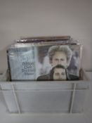 Two boxes of LP records mainly rock and pop, including Beatles' White Album', Black Sabbath,