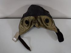 A leather flying helmet