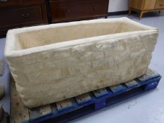 A composition garden trough