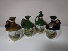 Four Rutherfords Scotch Whisky decanters,