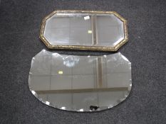 A brass framed mirror and an early 20th century unframed mirror