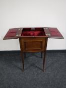 A Victorian mahogany sewing box