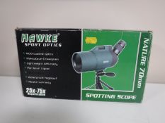A boxed Hawke Sports Optics 25X75 magnification spotting scope