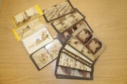 A small collection of early twentieth century postcards, stereoviewer slides etc.